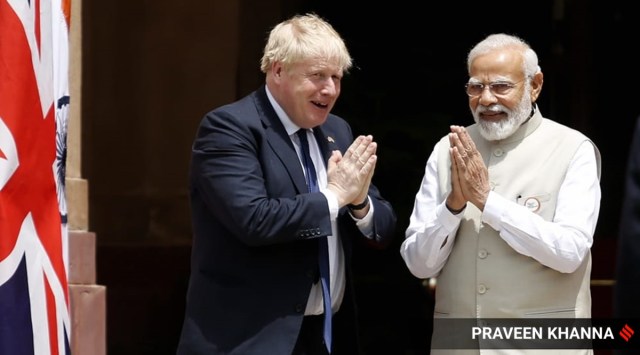UK PM Boris Johnson with PM Modi in New Delhi on Friday. (Express Photo: Praveen Khanna) 