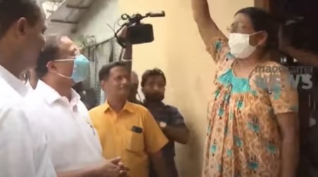 As soon as Minister V Muraleedharan stepped into their premises, the woman in the house raised slogans praising Vijayan and his development programmes. (Photo: Manorama News)