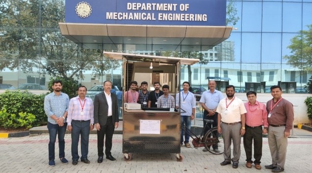 Students of the Vidyavardhaka College of Engineering in Mysuru who designed the cart. (Express photo)