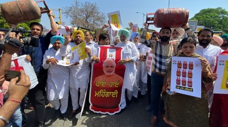 Former minister Balbir Singh Sidhu along with other Congress leaders during protest against the Central government on the issue of fuel price hike, at Phase 7 light point in Mohali (Express Photo by Jasbir Malhi) 