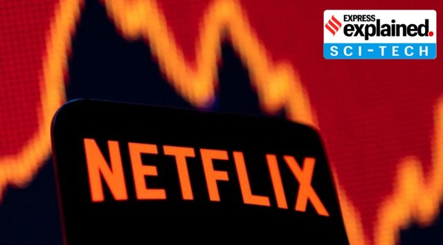 Smartphone with Netflix logo is seen in front of a stock graph in this illustration. (Reuters: Dado Ruvic)