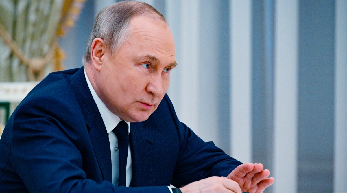 Russian President Vladimir Putin speaks to UN Secretary-General Antonio Guterres during their meeting in the Kremlin, in Moscow, Russia, Tuesday, April 26, 2022. (Vladimir Astapkovich, Sputnik, Kremlin Pool Photo via AP)