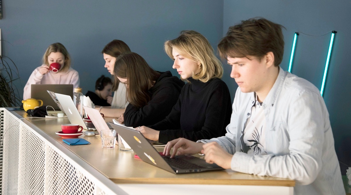 Patrons on March 14 2022, at a cafe in Yerevan, Armenia, that draws Russian immigrants. Since their country invaded Ukraine, Russian tech workers have left by the thousands.  (Daro Sulakauri/The New York Times)