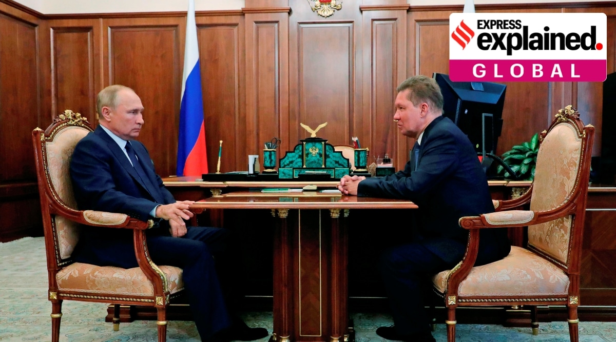 Russian President Vladimir Putin, left, listens to Russian gas monopoly Gazprom Head, Alexei Miller during their meeting  in Moscow, Russia, Wednesday, Sept. 16, 2020. (Mikhail Klimentyev, Sputnik, Kremlin Pool Photo via AP)