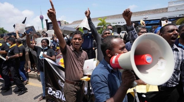 Sri Lankans shout slogans against the government during a protest in Colombo, Wednesday (AP/PTI)