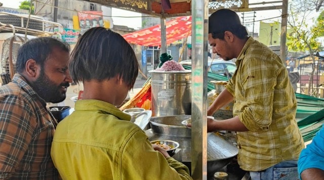 Mohammad Sajid has been selling biryani in the market on Meerut Road in Uttar Pradesh’s Sardhana for the last three years. (Express)