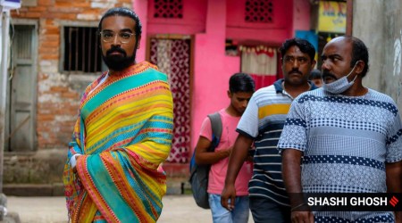 man wearing saree, man wears saree, pushpak sen, bengali man wears saree, men female clothing, gender neutral dressing, indian express