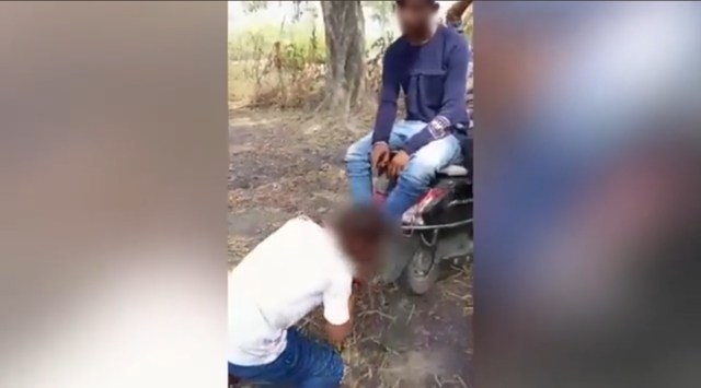 In the viral video, the assaulters can be heard threatening and using casteist slurs while assaulting the Dalit boy (Screengrab from the video of the incident)
