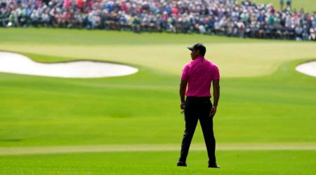 Tiger Woods waits to play on the second fairway during the first round at the Masters golf tournament on Thursday, April 7, 2022, in Augusta, Ga. (AP Photo/Charlie Riedel)