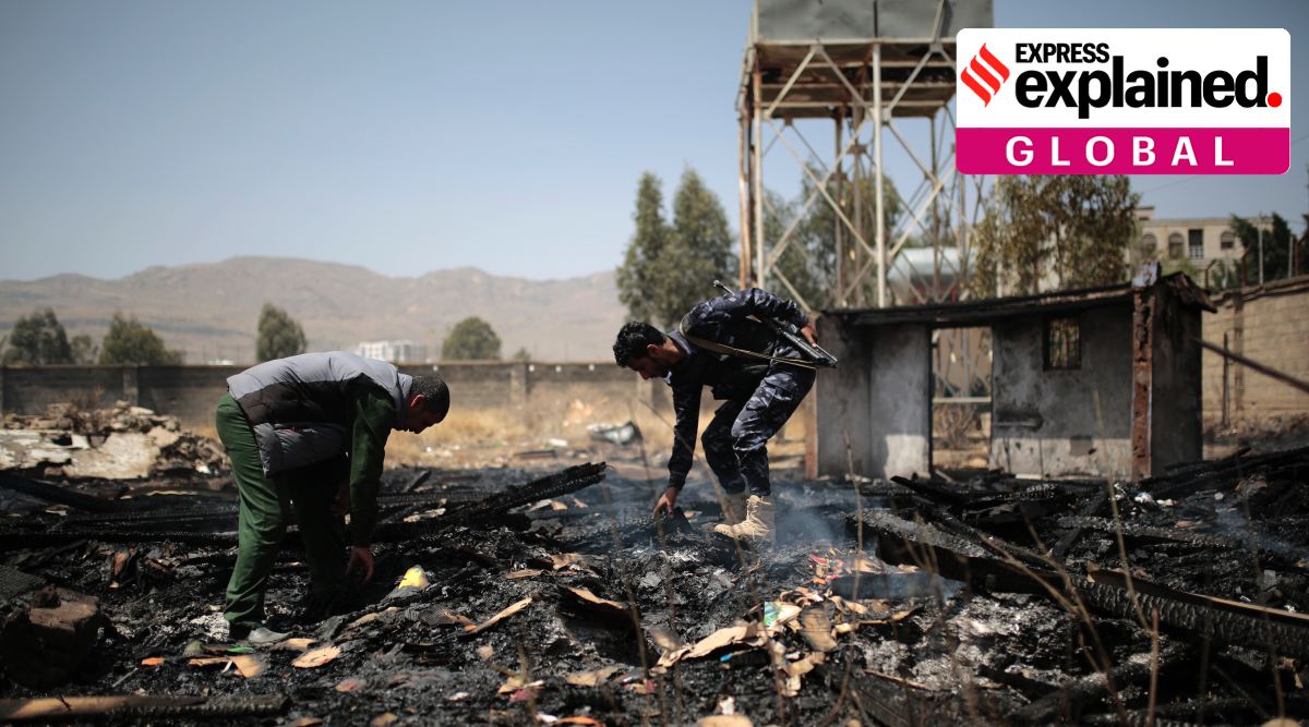 Yemeni police inspect a site of Saudi-led airstrikes targeting two houses in Sanaa, Yemen, Saturday, March 26, 2022. (AP Photo/Hani Mohammed)


