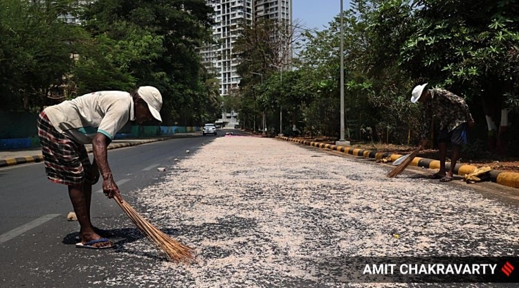  As April temperature increases, Maharashtra experiences heat waves. Local fishermen dry their fresh catch (shrimps) on the scorching asphalt at the back roads of Nerul in Navi Mumbai on Thursday afternoon.
(Express Photo by Amit Chakravarty)