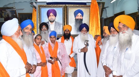 Portraits of two martyrs of Behbal Kalan police firing displayed at Central Sikh Museum. (Photo: Twitter/@SGPCAmritsar)