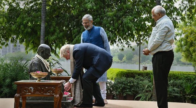 British Prime Minister Boris Johnson garlands a statue of Mahatma Gandhi at the Sabarmati Ashram, in Ahmedabad, Thursday, April 21, 2022. (PTI Photo) 