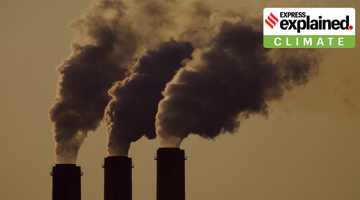 File photo of emissions rising from the smokestacks at the Jeffrey Energy Center coal power plant as the suns sets, near Emmett, Kansas.  (AP)