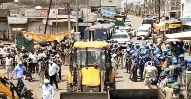 During the demolition drive in Khargone on Monday. (Express Photo)