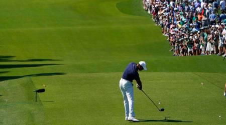 Tiger Woods tees off on the third hole during a practice round for the Masters golf tournament on Monday, April 4, 2022, in Augusta, Ga. (AP Photo/Jae C. Hong)