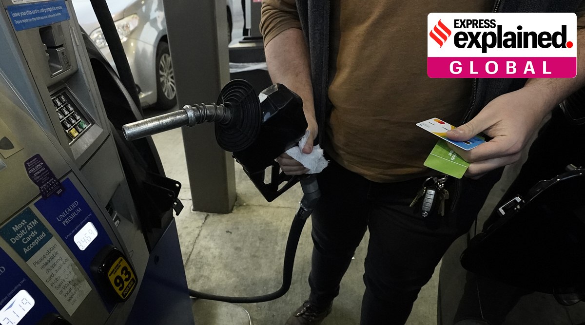 A customer prepares to pump gasoline into his car at a Sam's Club fuel island in Gulfport, Miss. (AP Photo/Rogelio V. Solis, File)
