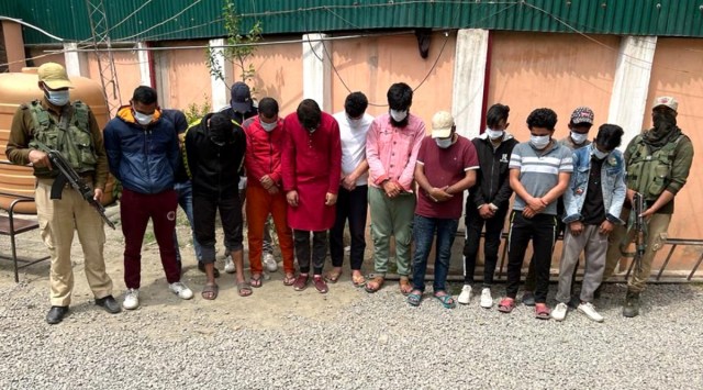 Srinagar police arrested thirteen accused in a case related to allegedly raising anti-national and provocative slogans inside Jamia Masjid, in Srinagar on Saturday. (ANI Photo)