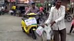 man ties donkey to electric scooter, man protest against ola scooter, ola scooter, donkey tied to scooter, Mahrashtra, Beed, indian express