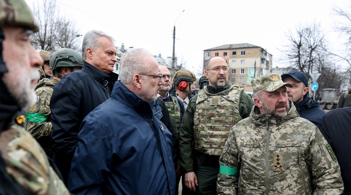 Lithuanian President Gitanas Nauseda, Polish President Andrzej Duda, Latvian President Egils Levits, Estonian President Alar Karis and Ukraine's Prime Minister Denys Shmyhal visit the town of Borodianka, as Russia's attack on Ukraine continues, in Kyiv region, Ukraine April 13, 2022. (Ukrainian Governmental Press Service/Handout via Reuters)
