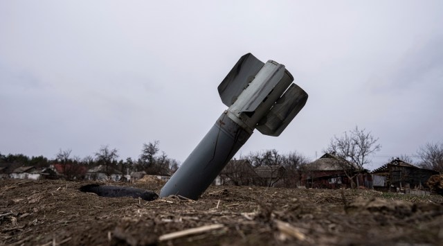 
The tail of a missile sticks out in a residential area in Yahidne, near of Chernihiv, Ukraine, April 12, 2022. (AP)