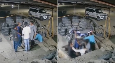 concrete slab collapse, men fall drain slab collapse, rajasthan drain slab collapse, road cave in videos, viral videos, indian express