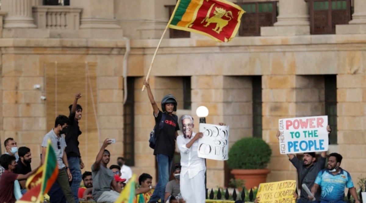 A protestor wearing a mask of Sri Lanka's President Gotabaya Rajapaksa performs during a protest against President Rajapaksa in front of the Presidential Secretariat in Colombo, Sri Lanka. (REUTERS/Dinuka Liyanawatte)