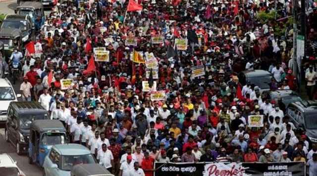 Members and supporters of Sri Lanka's opposition the National People's Power Party march towards Colombo from Beruwala, during a protest against Sri Lankan President Gotabaya Rajapaksa, amid the country's economic crisis, in Colombo, Sri Lanka April 19, 2022. (Reuters)
