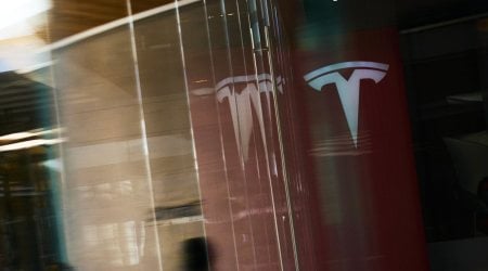 Tesla signage inside at the Westfield Century City shopping mall in Los Angeles, California, U.S., on Easter Sunday, April 17, 2022. (Bloomberg)
