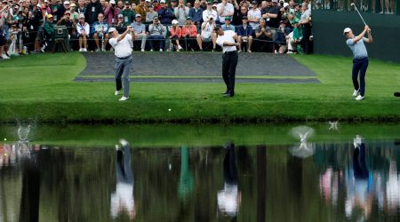 Tiger Woods, Justin Thomas and Fred Couples of the U.S. skim their shot on the water on the 16th during a practice round  (Source: Reuters)