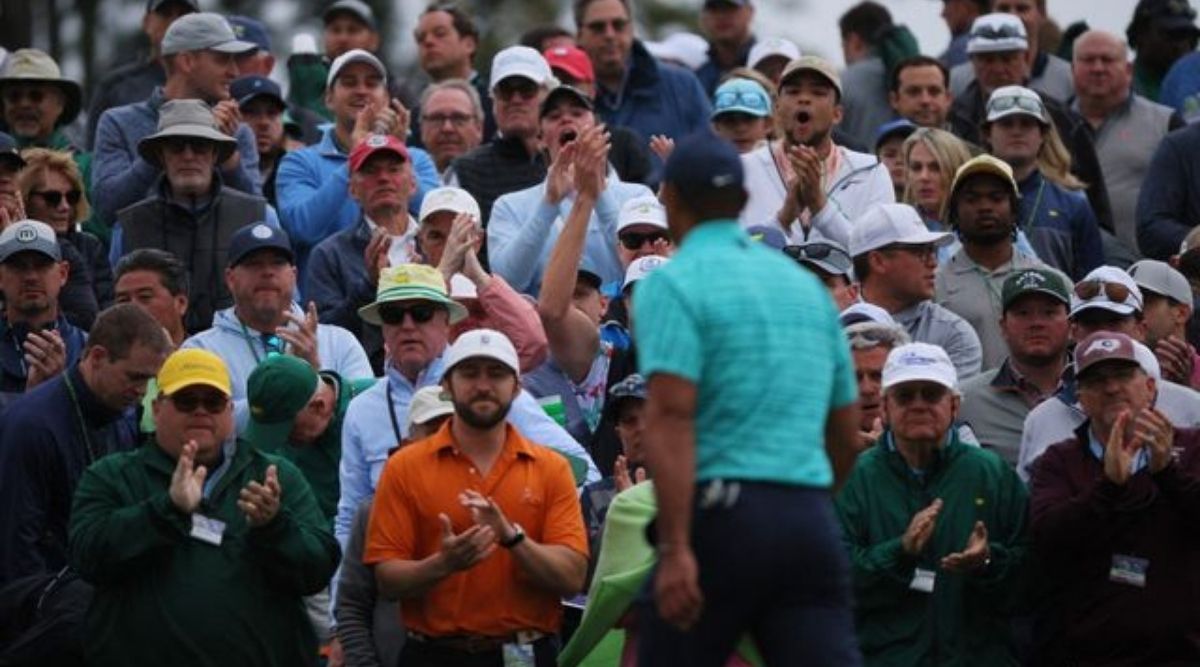 Tiger Woods fights back to make cut on tough day, Scheffler leads at ...