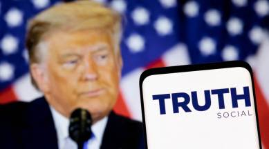 FILE PHOTO: Illustration shows Truth social network logo and display of former U.S. President Donald Trump