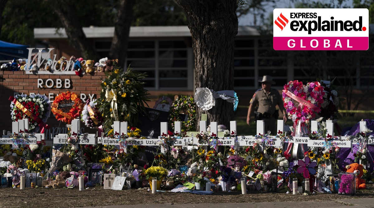 Flowers and candles are placed around crosses at a memorial outside Robb Elementary School to honor the victims killed in this week's school shooting in Uvalde, Texas, Saturday, May 28, 2022. (AP)