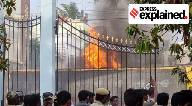 Protesters set ablaze police vehicles, buses and even the house of ruling YSRCP MLA from Munnidivaram, P Satish. (Express/Sourced)