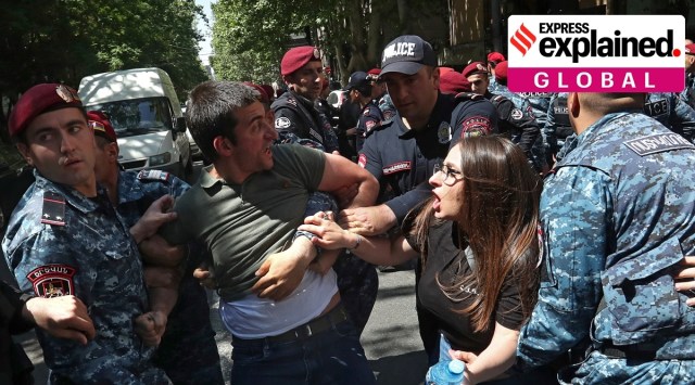 Police officers detain participants of an anti-government demonstration in Yerevan, Armenia. (Reuters)
