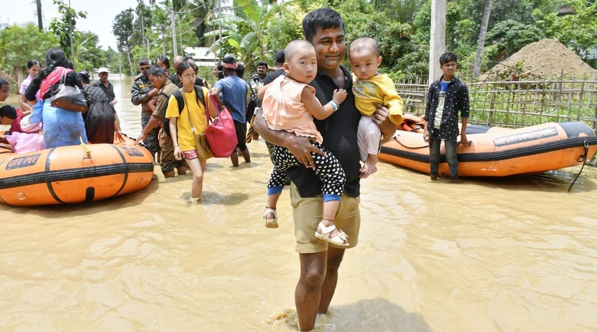 State Disaster Response Fund personnel during rescue operations in Hojai district of Assam on Wednesday. (Photo: PTI)