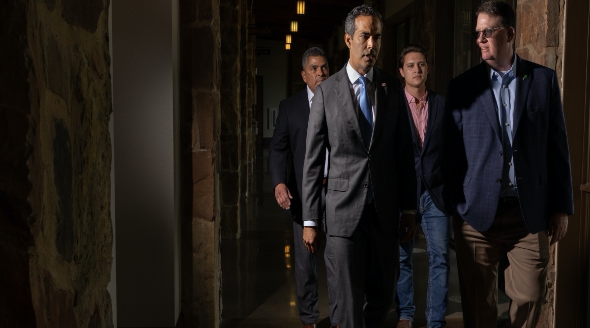 George P. Bush, center, a Republican primary candidate for Texas attorney general, arrives at a forum in Flower Mound, Texas, May 11, 2022. (Shelby Tauber/The New York Times)