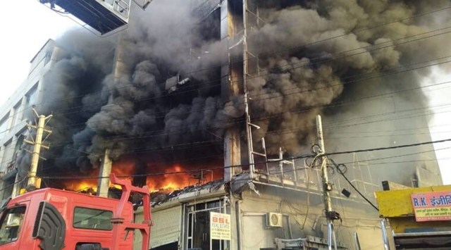 The fire broke out on the first floor and then spread to the second and the third floors. (Express Photo)