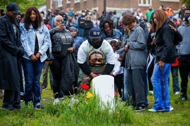 Terrence Floyd and members of the Floyd family stand near the headstone for George Floyd at the Say Their Names Memorial on the second anniversary of the death of George Floyd in Minneapolis. (Reuters)