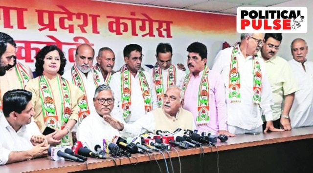 The former MLAs after joining Congress with state party chief Udai Bhan, former CM, Bhupinder Singh Hooda, and Rajya Sabha MP, Deepender Hooda, at Haryana Congress Bhawan in Chandigarh on Monday. (Express photo by Kamleshwar Singh) 