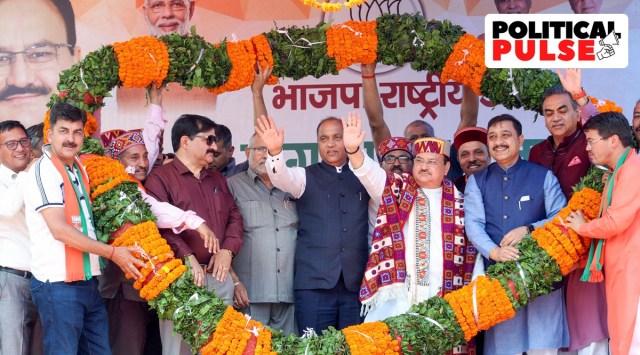 BJP National President JP Nadda being garlanded by party workers during a public rally, in Kullu. Himachal Pradesh CM Jai Ram Thakur is also seen. (PTI Photo)