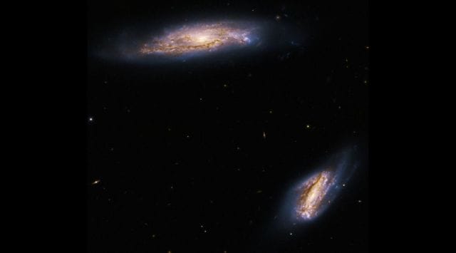 The image used data from two separate Hubble observations of Arp 303. (Image credit: NASA, ESA, K. Larson (STScI), and J. Dalcanton (University of Washington); Image Processing: G. Kober (NASA Goddard/Catholic University of America))