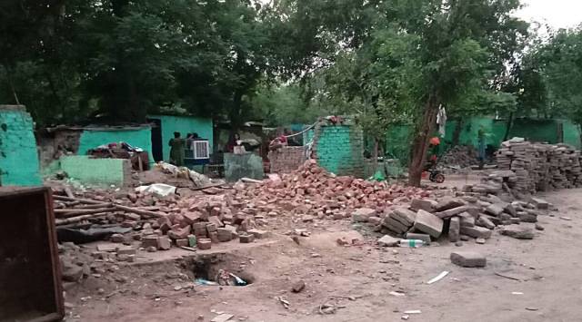 Residents have taken down parts of Janta Colony in Sector 25, Chandigarh, on their own, before the UT Administration reclaims 10 acres of land. (Express Photo by Jasbir Malhi)