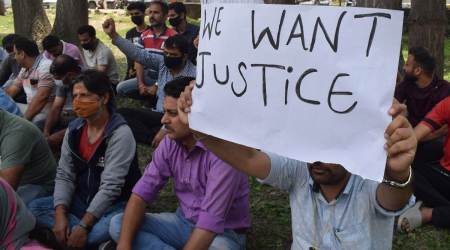Kashmiri Pandits protest in Srinagar, Sunday. (Express photo by Shuaib Masoodi)
