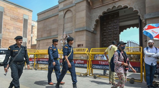 Security personnel guard outside the Gyanvapi mosque after its survey by a commission, in Varanasi, May 17, 2022. (PTI Photo) 