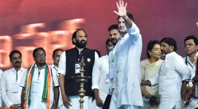 Congress leader Rahul Gandhi waves at his supporters during a public meeting in Warangal, Friday. TPCC president A Raventh Reddy, and Congress leaders N Uttam Kumar Reddy and Komatireddy Venkat Reddy are also seen. (PTI)