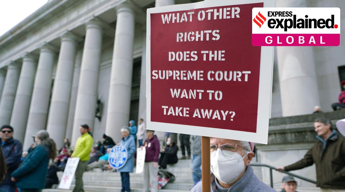 A person holds a sign referencing the US Supreme Court as they take part in a rally in favour of abortion rights on the steps of the Temple of Justice, which houses the Washington state Supreme Court, Tuesday, May 3, 2022, at the Capitol in Olympia, Wash. (AP Photo/Ted S. Warren, File)