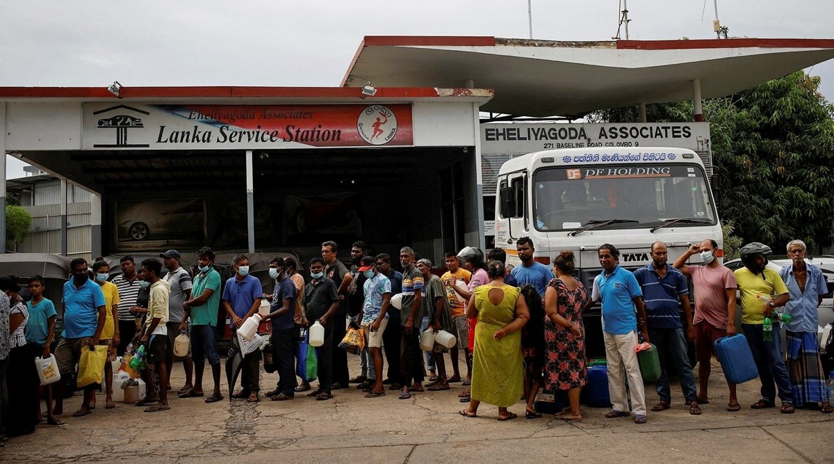 People wait in a queue to buy petrol at a fuel station, amid the country's economic crisis in Colombo, Sri Lanka. (Reuters, file)