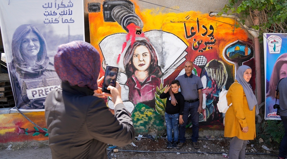 Palestinians visit the site where veteran Palestinian-American reporter Shireen Abu Akleh was shot and killed, in the West Bank city of Jenin. (AP, file)