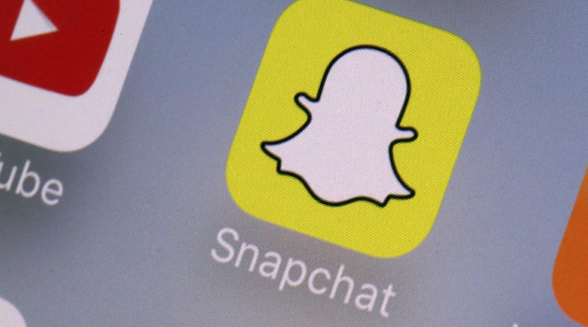 Snap cuts revenue forecast, will slow down hiring